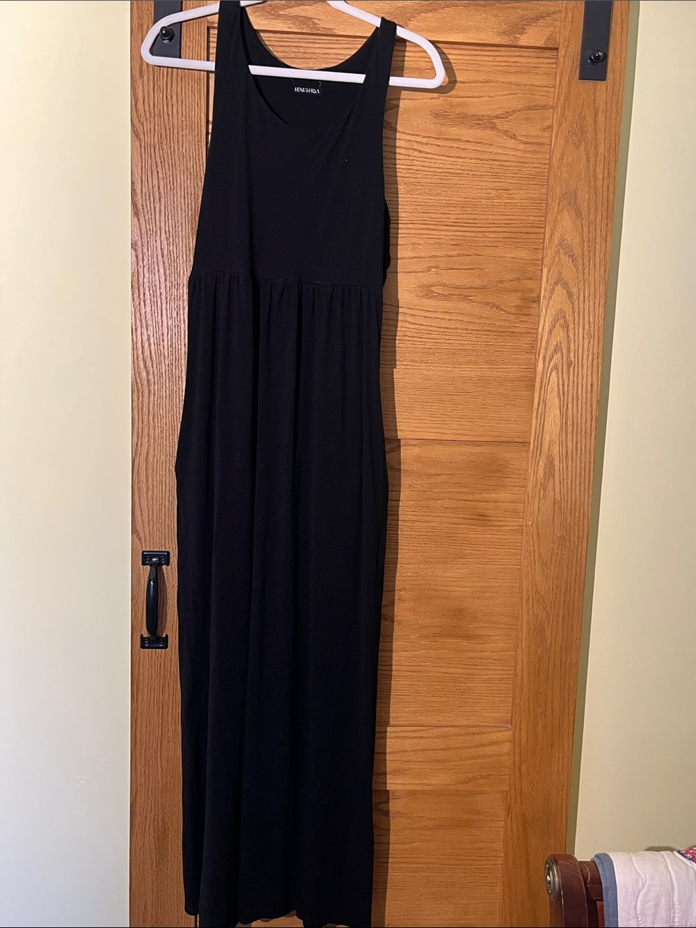 HEIMISH USA Black Sleeveless Maxi Dress with pockets